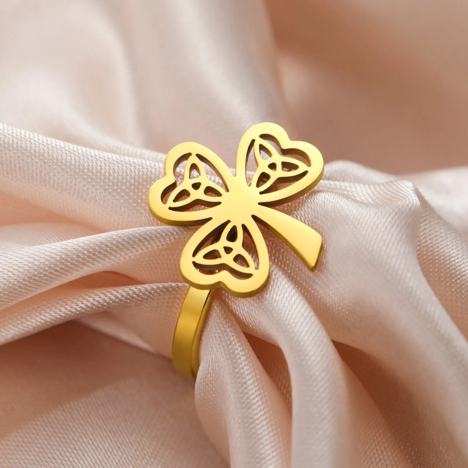 Stainless steel hollow ring with electroplated finish in gold or steel colour on hand