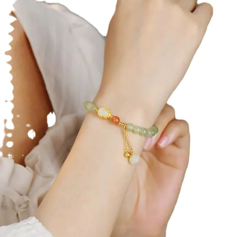 Qingshui jade women's bracelet with fu character and gold gourd motif, 6mm gold plated beads