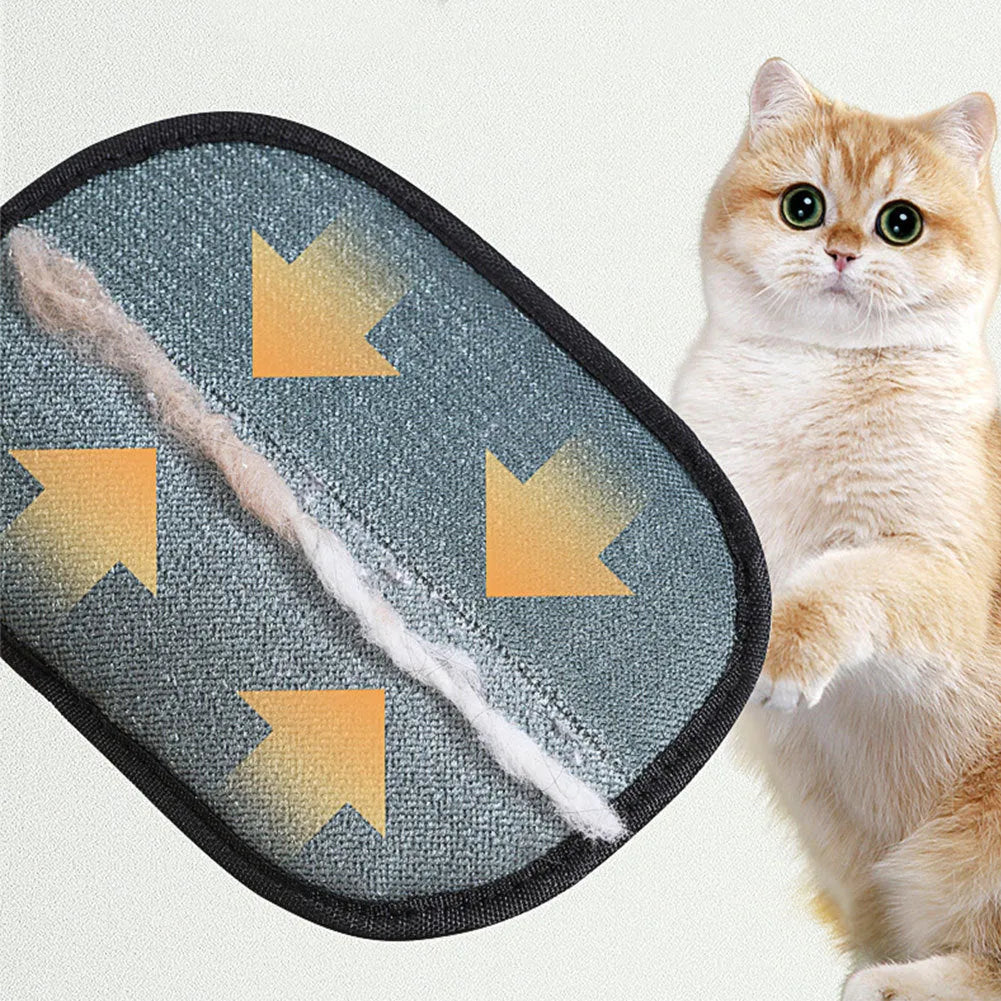 Black pet hair remover glove with soft silicone bristles on a hand, showing the dual-sided design.