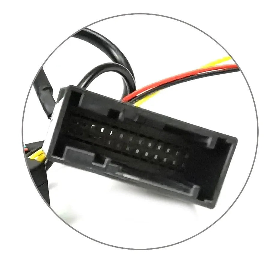 Black original car camera conversion box for Volkswagen and Skoda MIB hosts.