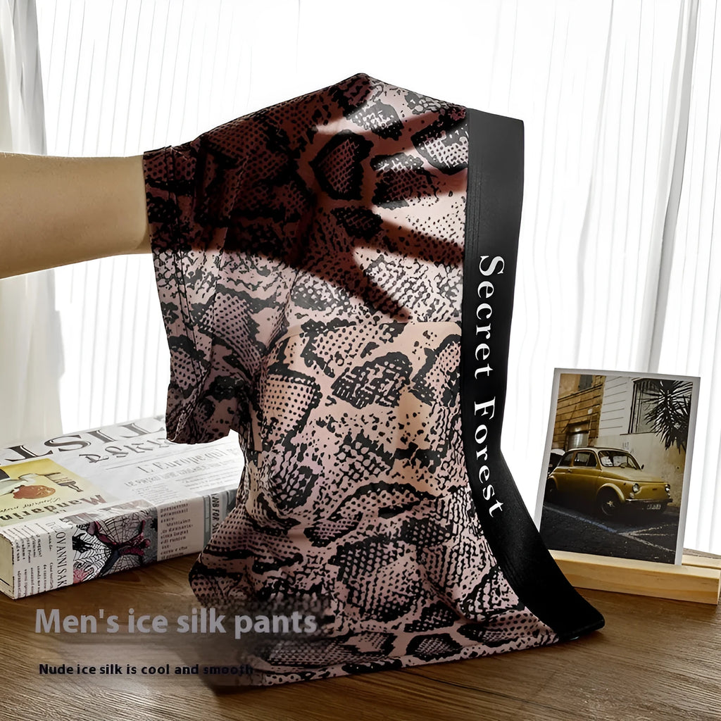 Men's thin polyester boxer shorts in loose fit mid-waist design available in black grey brown colours