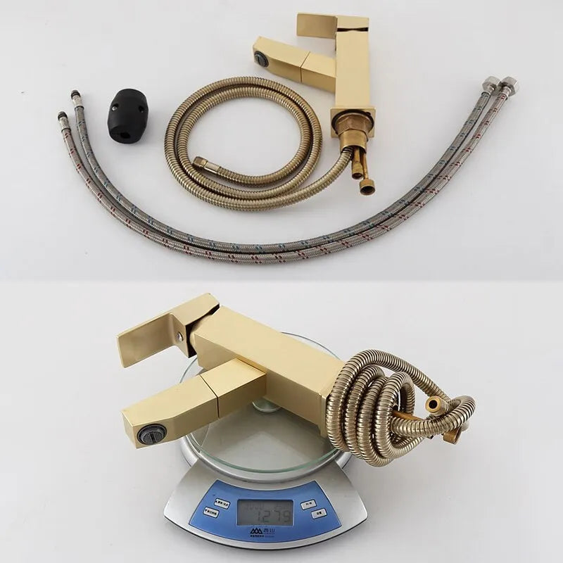 Brass square pull faucet with brushed gold finish for basin, showing high and low spout style options.