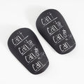 Pair of football shin guards in black colour showing front protective design