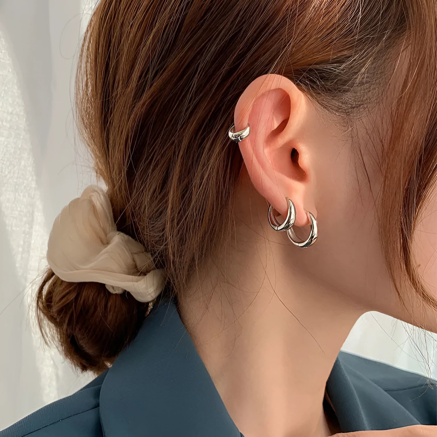 Women's geometric water drop earrings with retro minimalist design in gold or silver electroplated finish