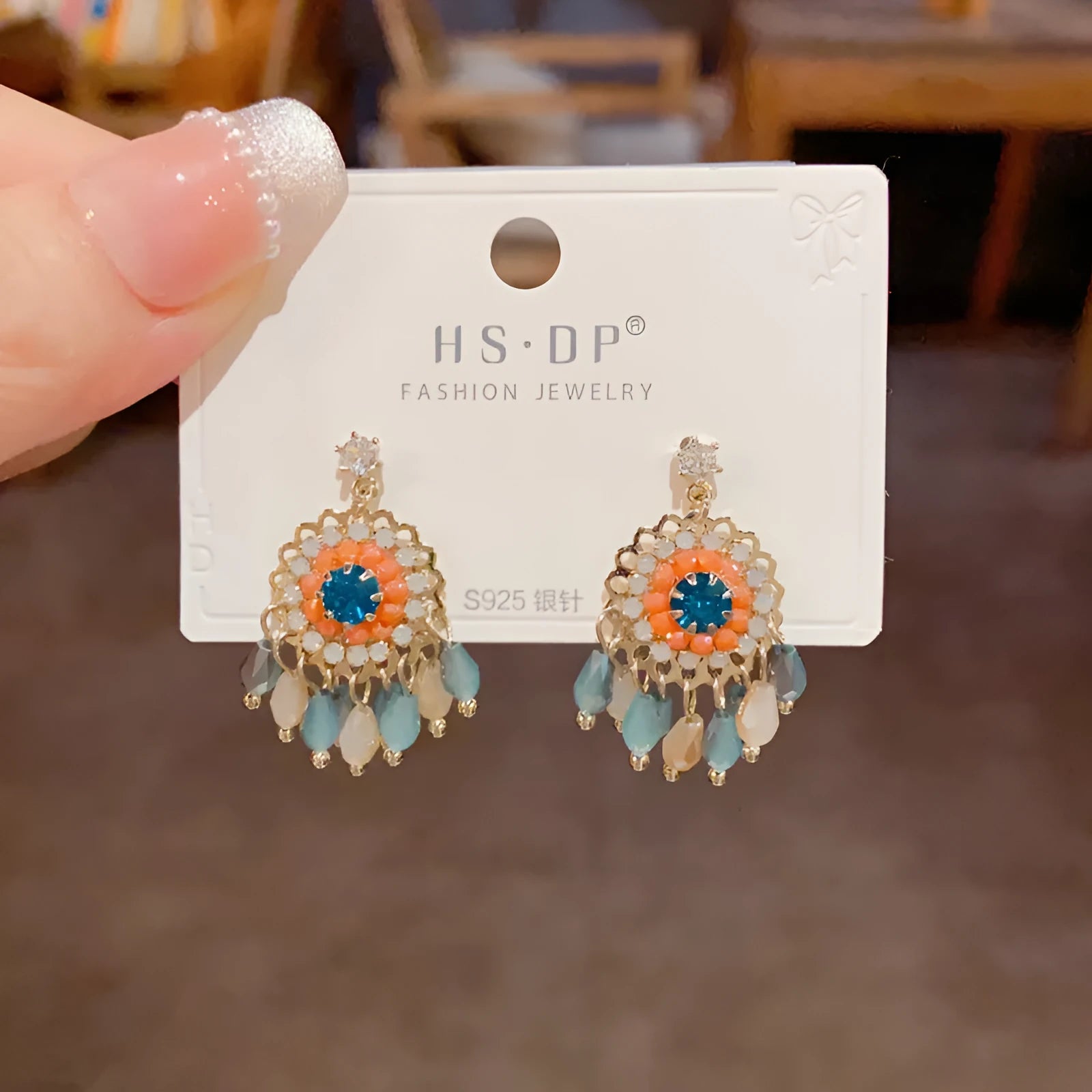 Purple and blue round crystal tassel earrings with diamond accents and thick gold plating