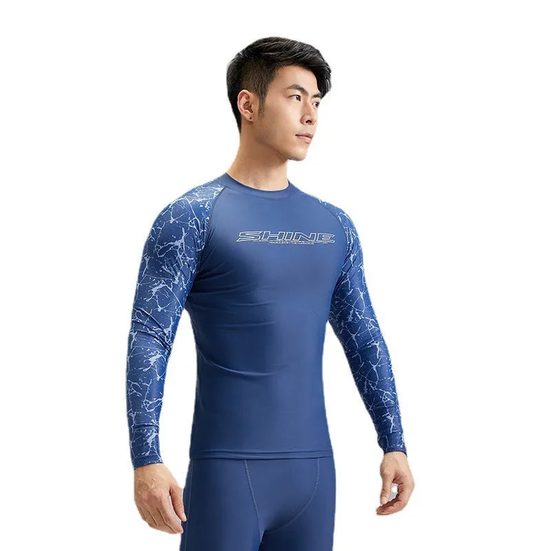 Dark blue men's swimwear set with patterned nylon top and matching swim trunks