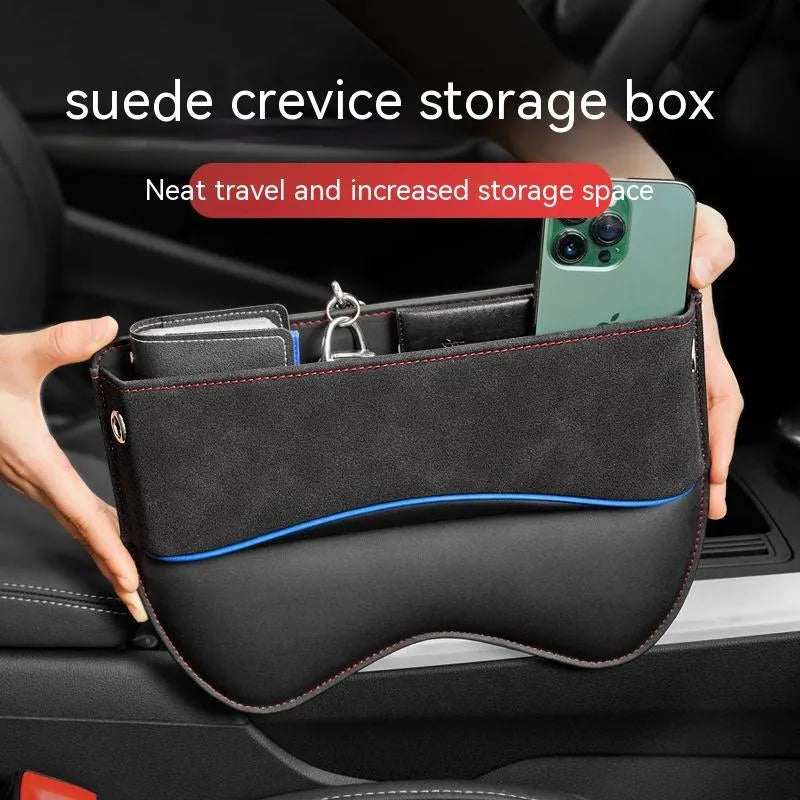 Leather car seat storage box in beige suede colour between vehicle seats