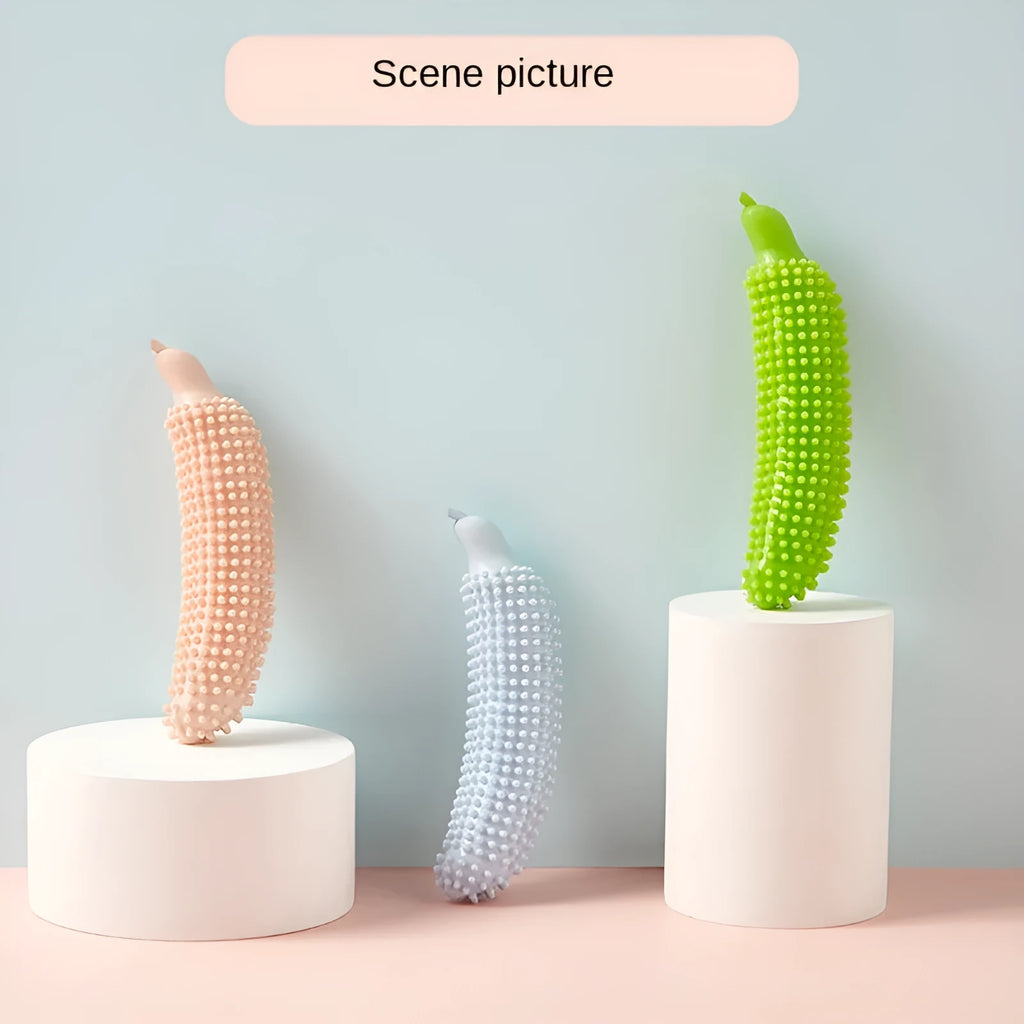 Green cucumber-shaped dog chew toy measuring 25cm length for teething and bite relief