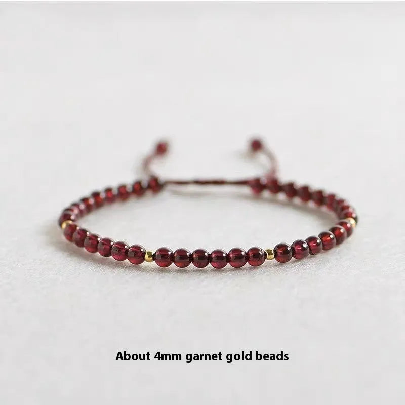 Hand-woven garnet red rope bracelet with flexible wire construction and national tide design elements