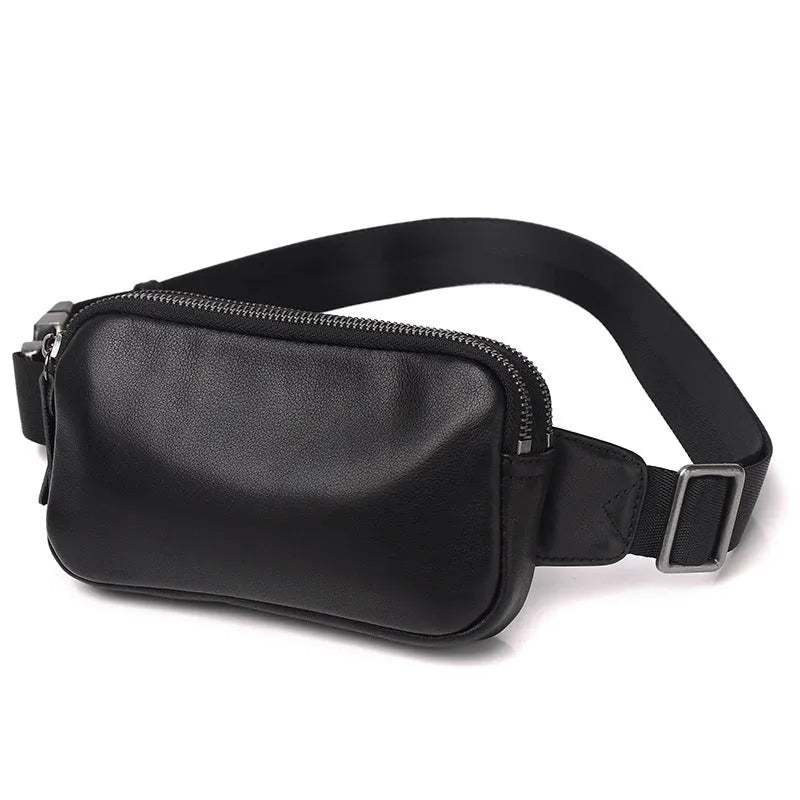 Men's small leather crossbody bag in cowhide showing compact dimensions and urban simplicity styling