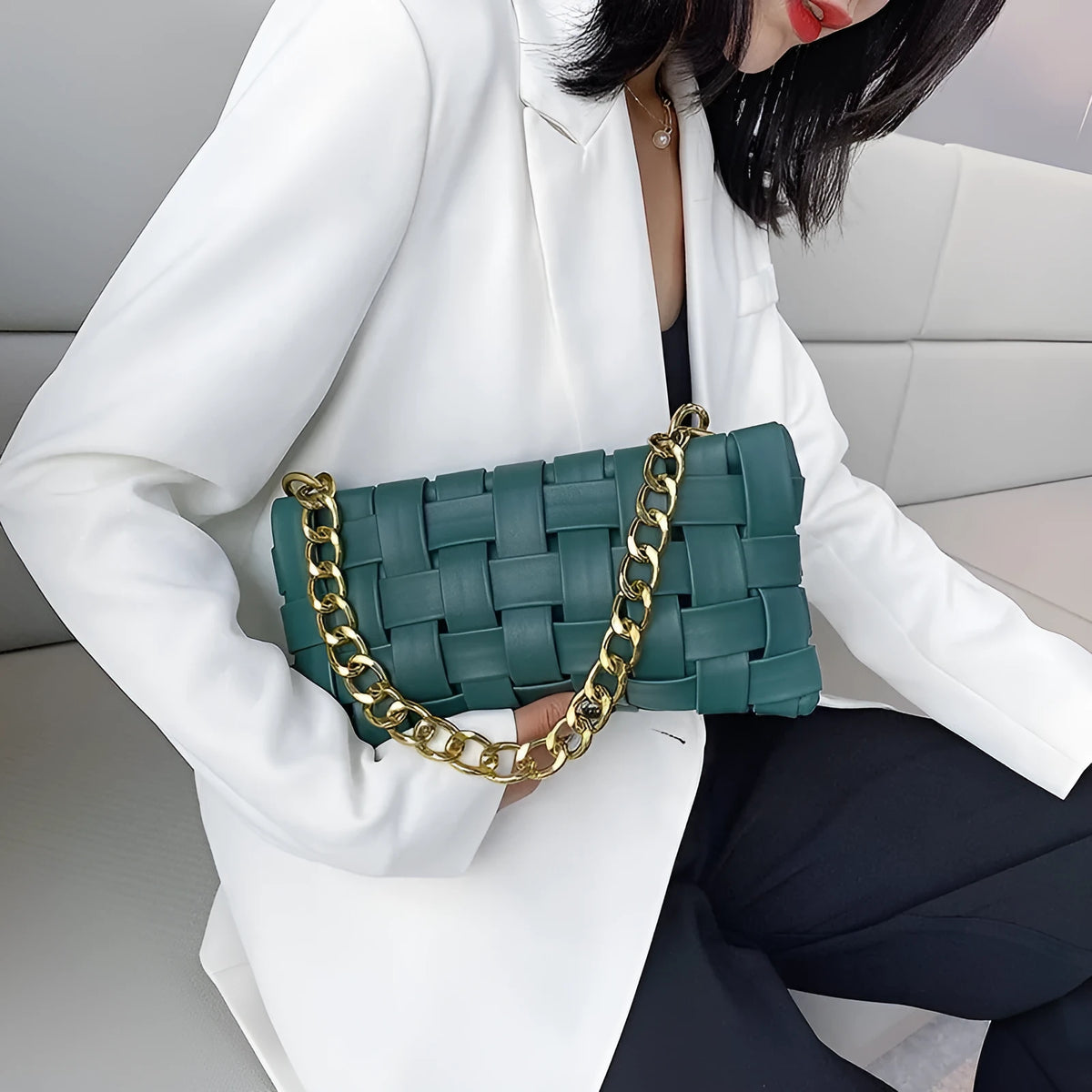 Women's one-shoulder underarm bag with PU exterior, polyester lining, and 27cm width in black, green, khaki, red, or white.