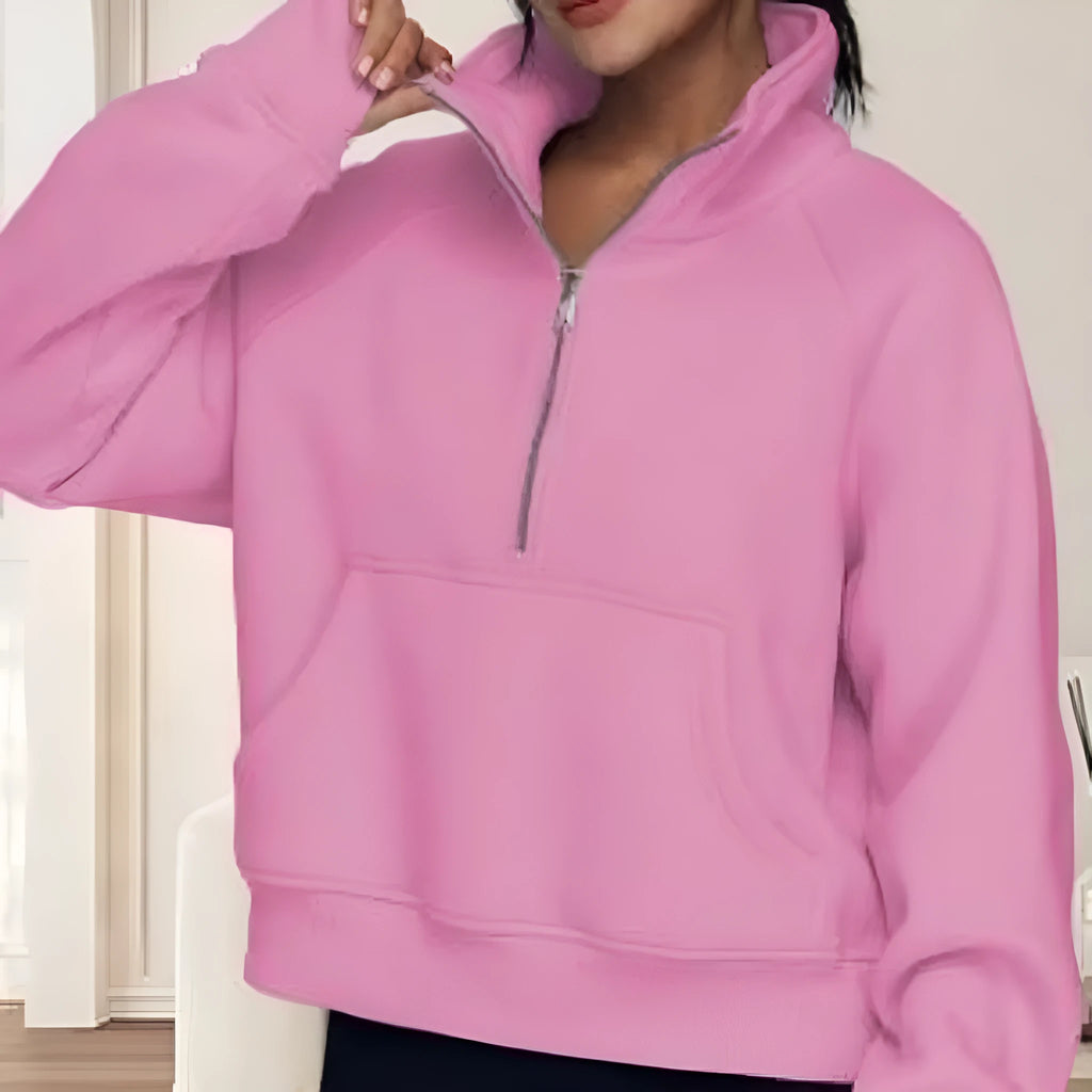 Women's loose fit lapel sweater with fleece lining and long raglan sleeves in a solid colour.