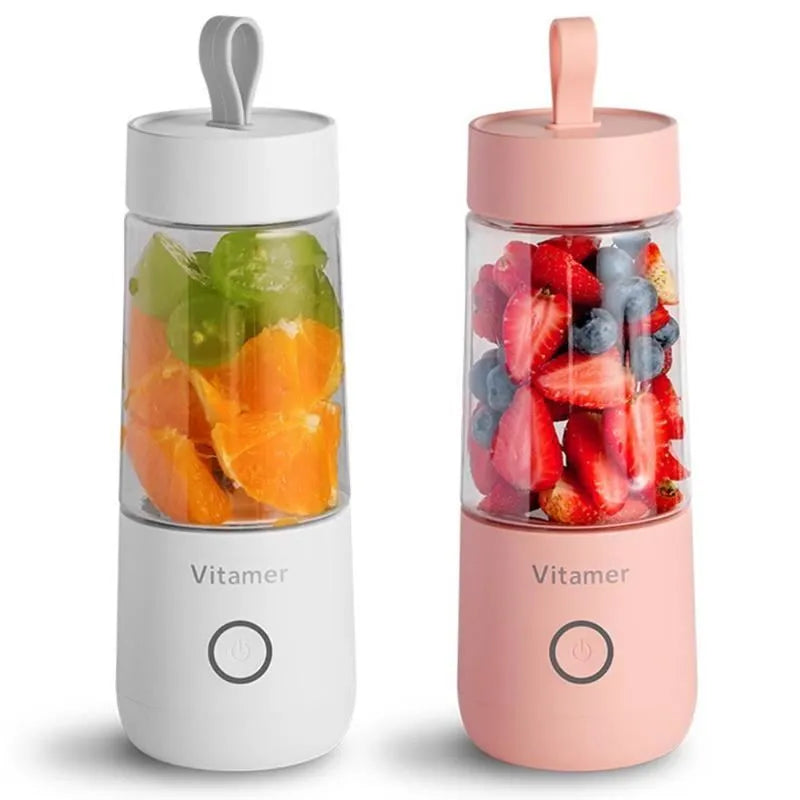 White portable USB rechargeable blender with 350ml cup and silicone handle on a table.