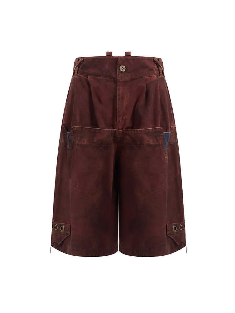 Men's black loose cropped pants with double waist design and washed stitching details