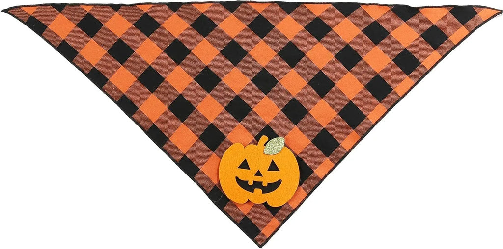 Orange Halloween dog bandana with pumpkin and skeleton felt appliques on plaid fabric