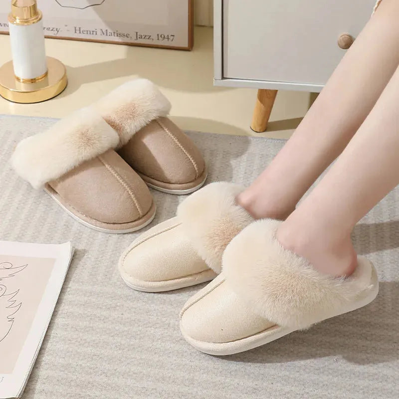 Women's brown plush indoor slippers with round toe, flat heel, and anti-slip PVC sole.