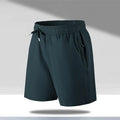 Men's loose fit quick-drying sports shorts in polyester fibre with micro-elastic waistband