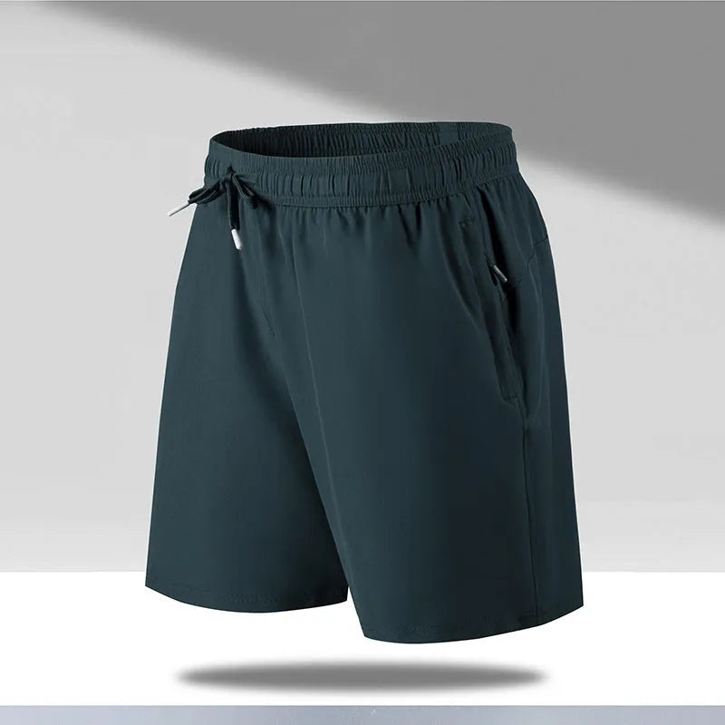 Men's loose fit quick-drying sports shorts in polyester fibre with micro-elastic waistband
