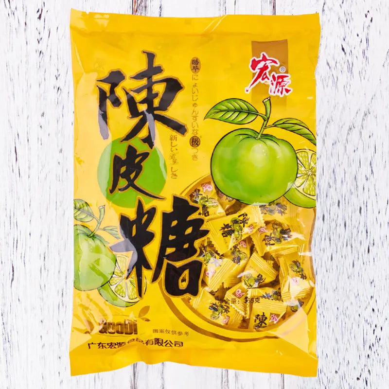 Assortment pack of plum sugar, guava, and tangerine peel flavoured hard candies in separate bags.