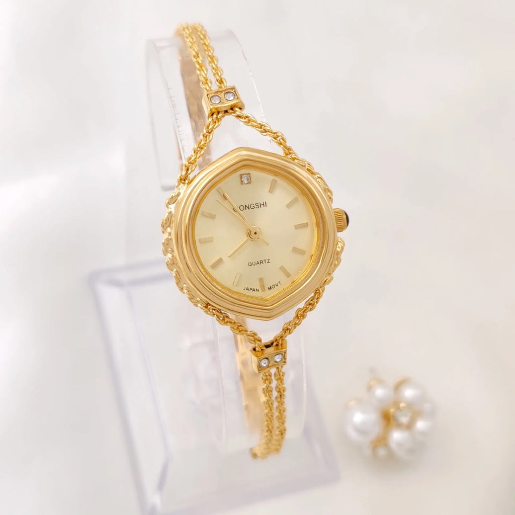 Gold or silver mori style women's quartz watch with 25mm dial and chain strap