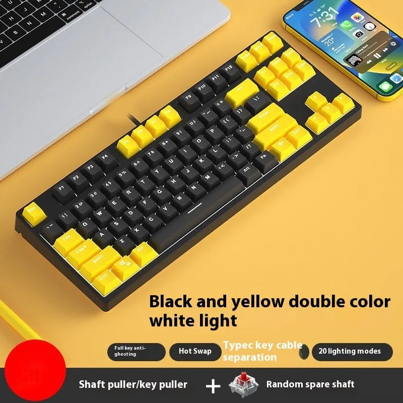 87-key wired mechanical keyboard with two-tone keycaps and metal frame, showing compact design and included tools