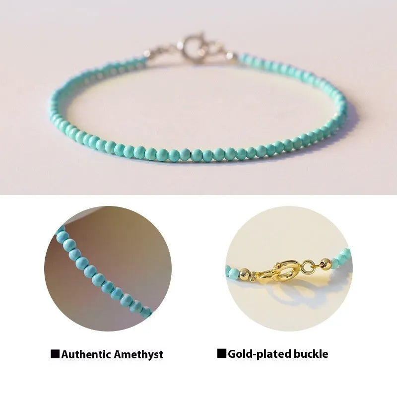 Natural 2mm raw ore turquoise bracelet on wrist, showing geometric beads and adjustable extension chain.