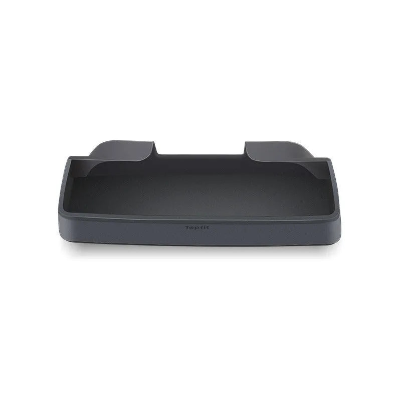 Black silicone sunglasses case installed inside a Tesla Model 3 or Y centre console armrest.