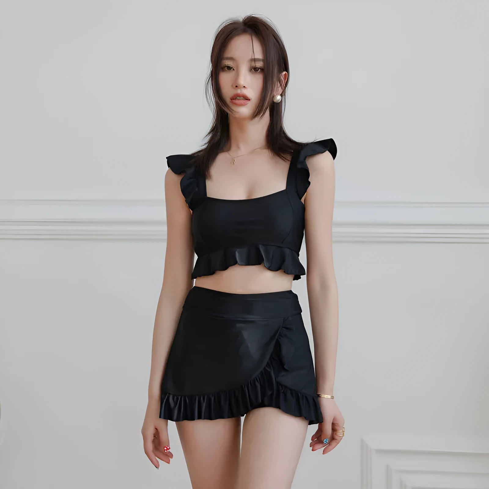 Black nylon swimsuit for women with split brief design