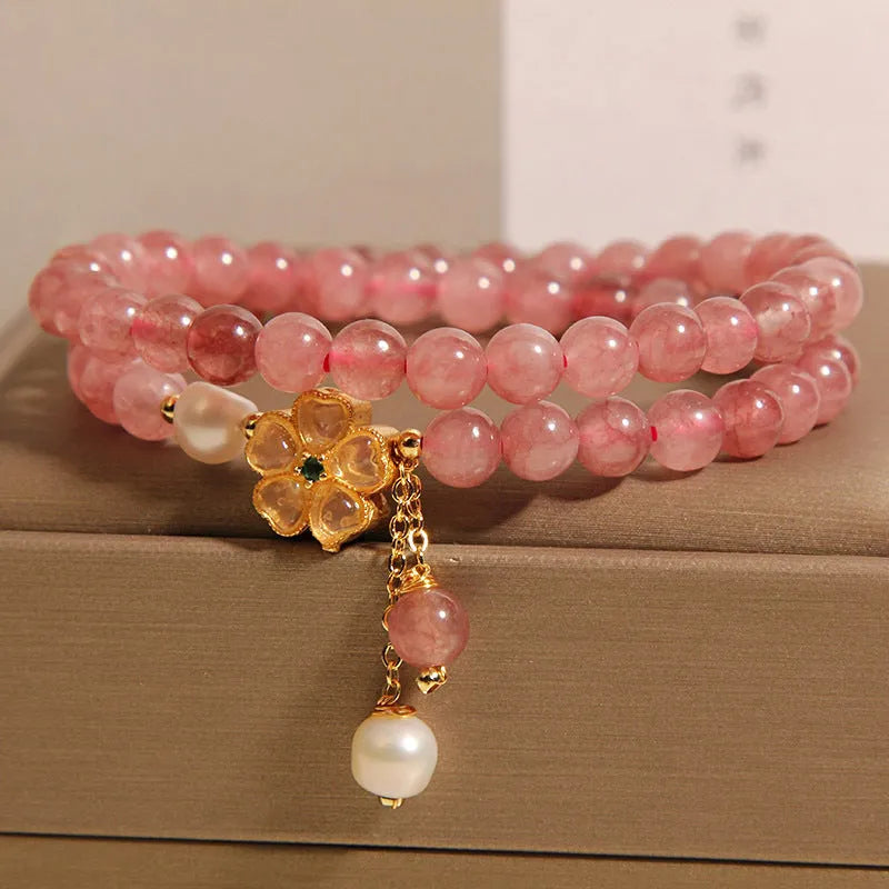 Women's double ring bracelet with strawberry quartz and four-leaf clover charm in Japanese-Korean style