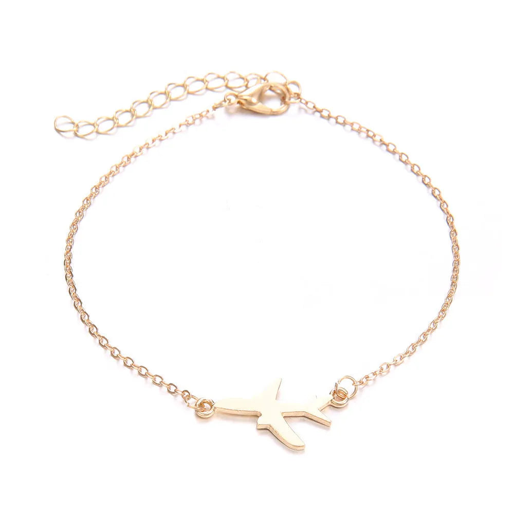 Three bohemian bracelets with heart-shaped alloy charms showing aircraft map designs in sku2104 colour.