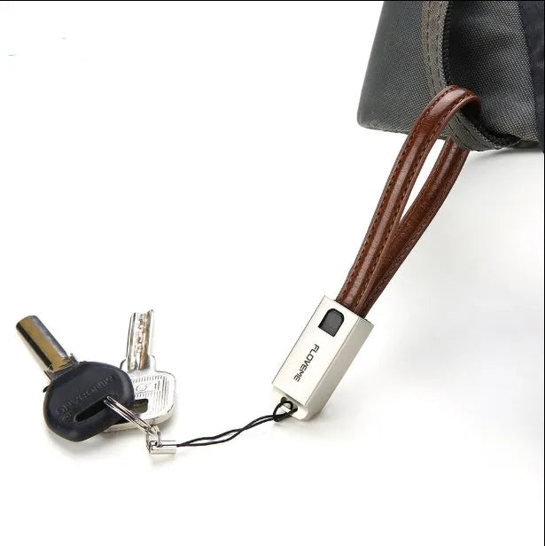 Short leather-wrapped USB-C to Lightning charging cable in black, brown, or red colour with zinc alloy connector