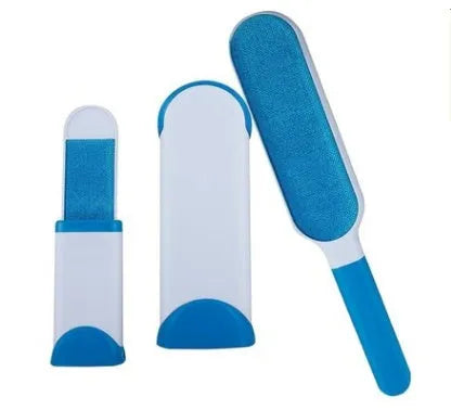 Blue reusable pet hair removal comb with double-sided flannel brush next to its self-cleaning base unit.
