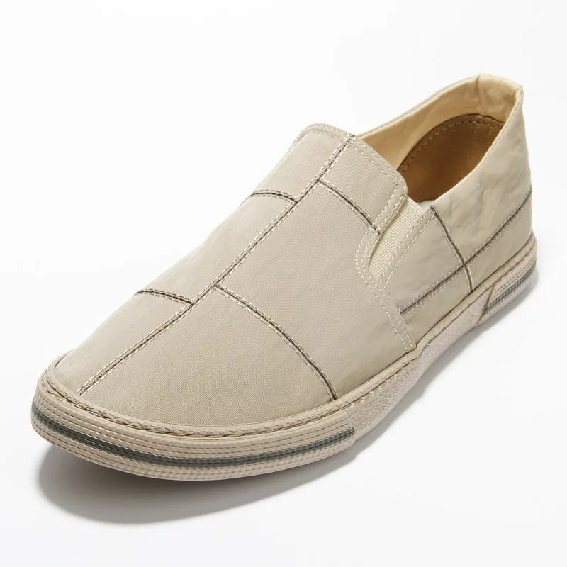 Men's low-top slip-on canvas shoes in various colours with round toe and vulcanised rubber sole