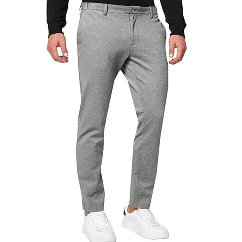 Men's slim-fit tapered chino trousers in a stretch cotton blend fabric, shown in a solid colour.