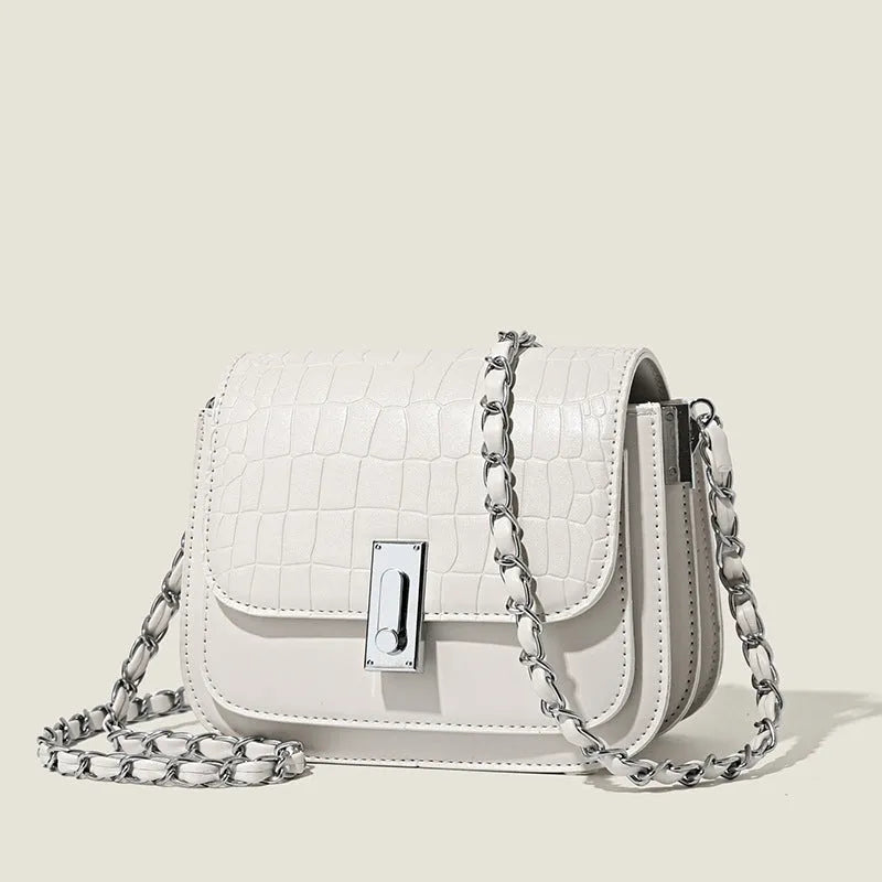 Women's black chain shoulder bag with cross-body strap and internal phone pocket, horizontal square shape