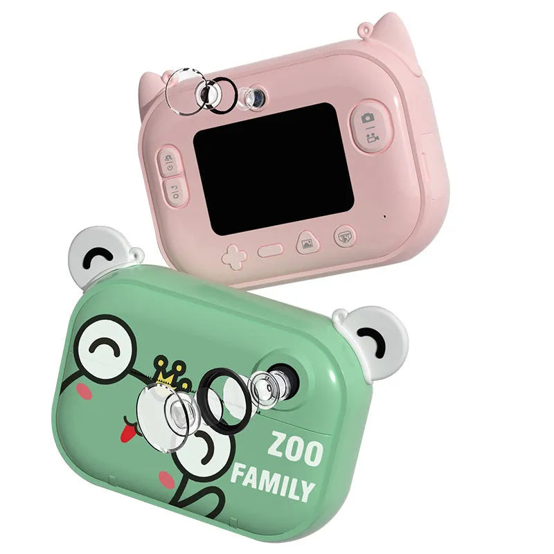 Pink, green, and blue compact digital camera with 2.4-inch screen on a lanyard with accessories