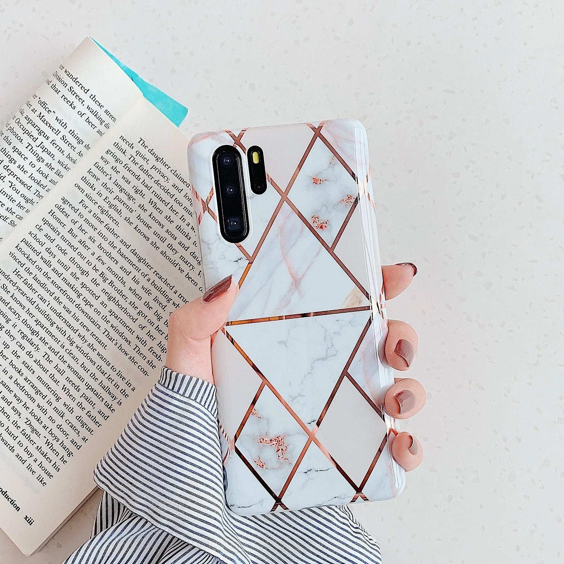 Electroplated marble finish TPU phone case showing back cover design for Huawei and Samsung smartphones