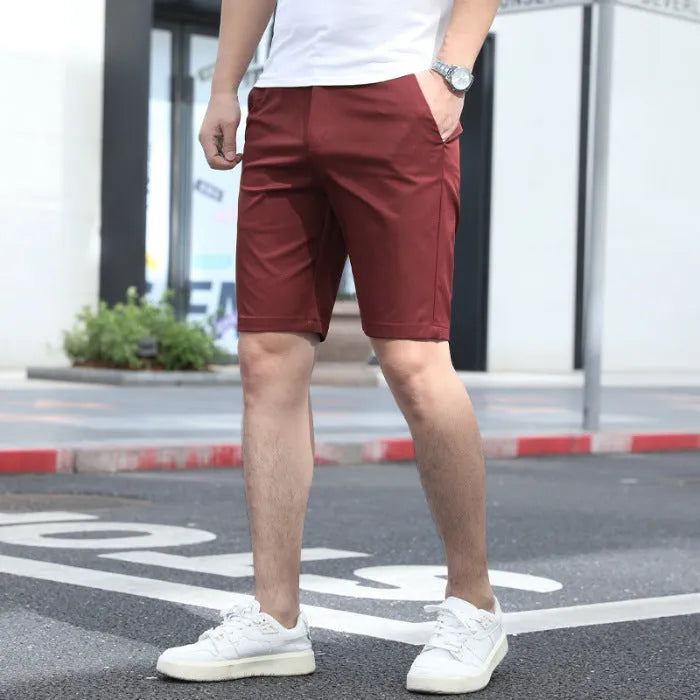 Men's loose-fit elastic waist casual trousers in a solid colour.