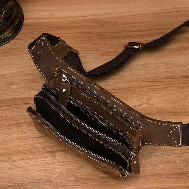 Brown top layer cowhide men's sports waist bag with pull closure and internal phone compartment