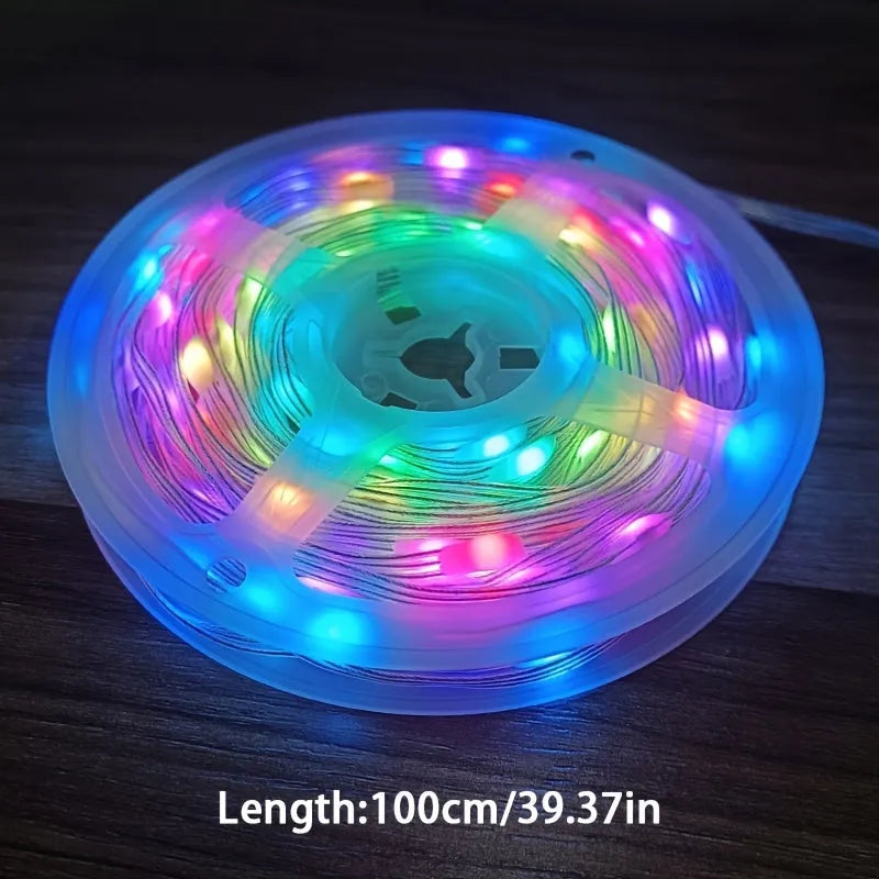 10-metre long flexible LED light string with 100 multi-colour bulbs lit up in a garden setting.