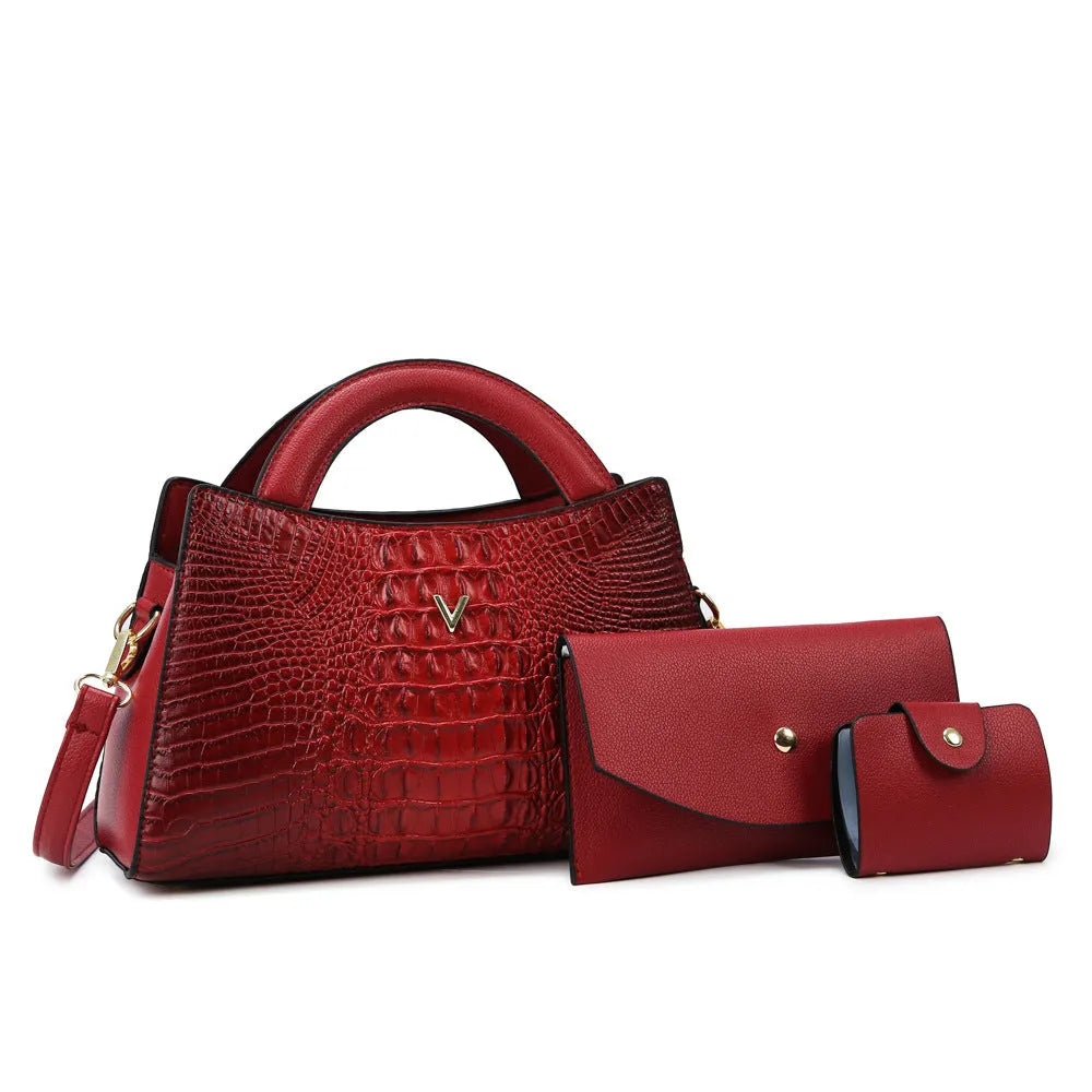 Women's black crocodile pattern crossbody bag with adjustable strap and front sandwich pocket.