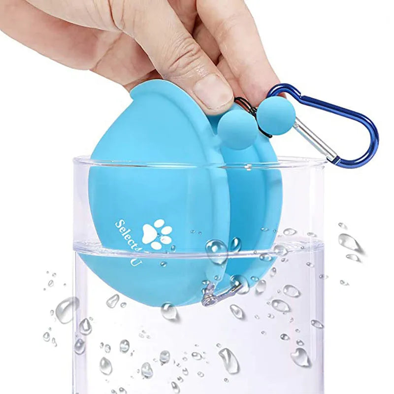 Yellow silicone dog treat bag with hook-and-loop waist attachment, measuring 9 by 9.5 cm
