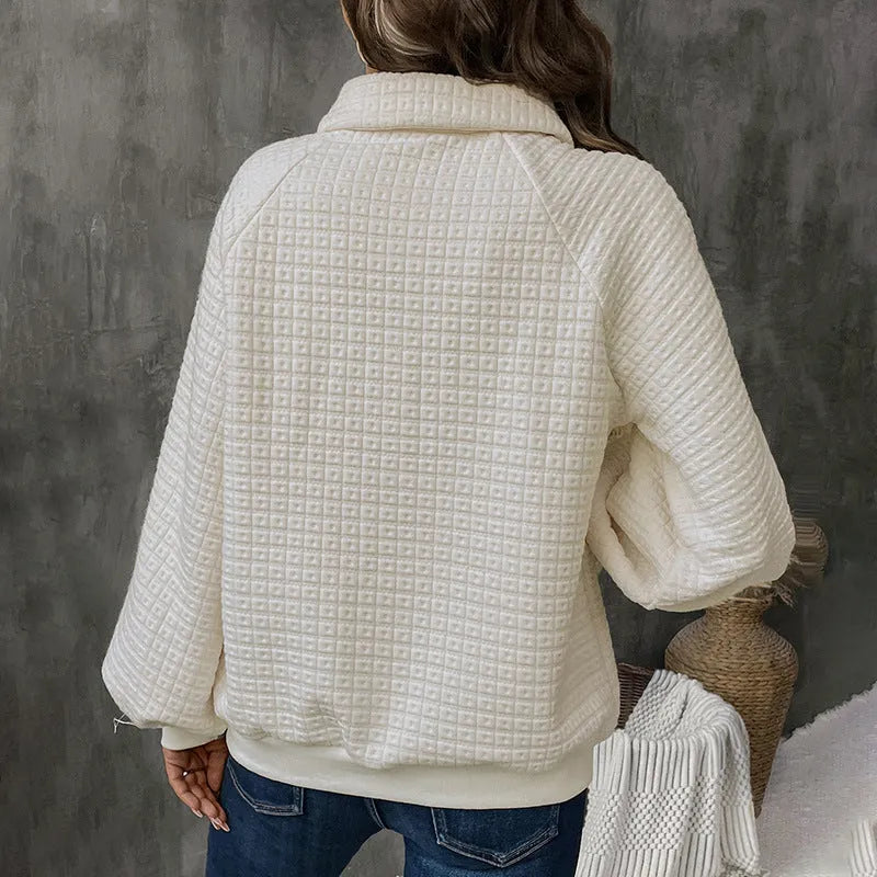Women's solid colour polo collar sweater with long sleeves in milky white, showing thickened texture and pullover style.