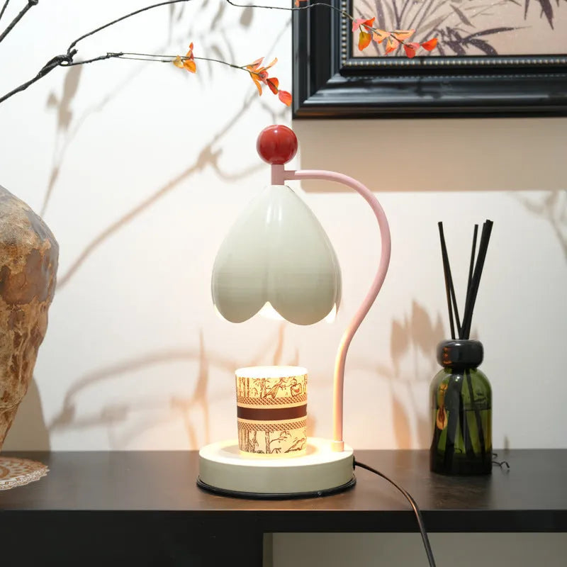 Linglan Melting Wax Lamp in cream white or dark green with metal construction and modern simplicity design