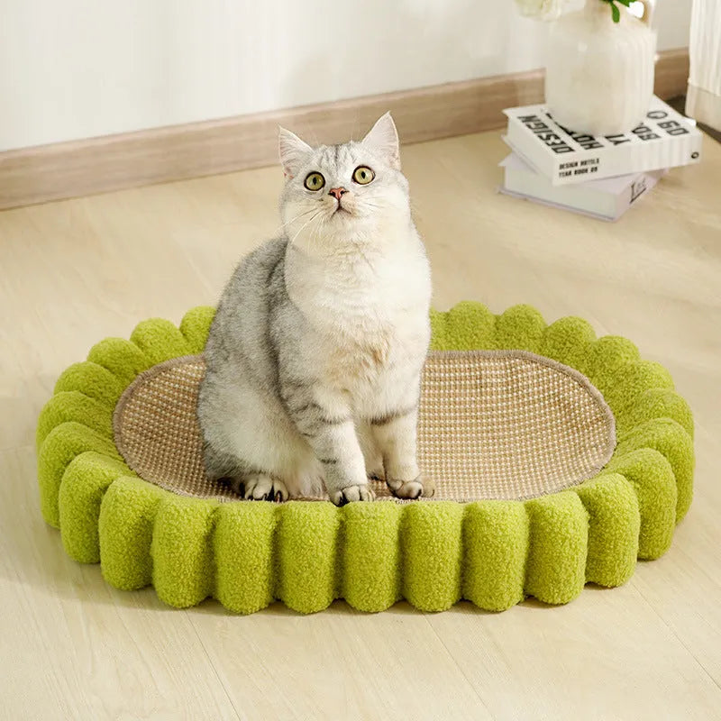 Green oval cat scratch pad bowl with sisal scratching surface measuring 65cm by 42cm
