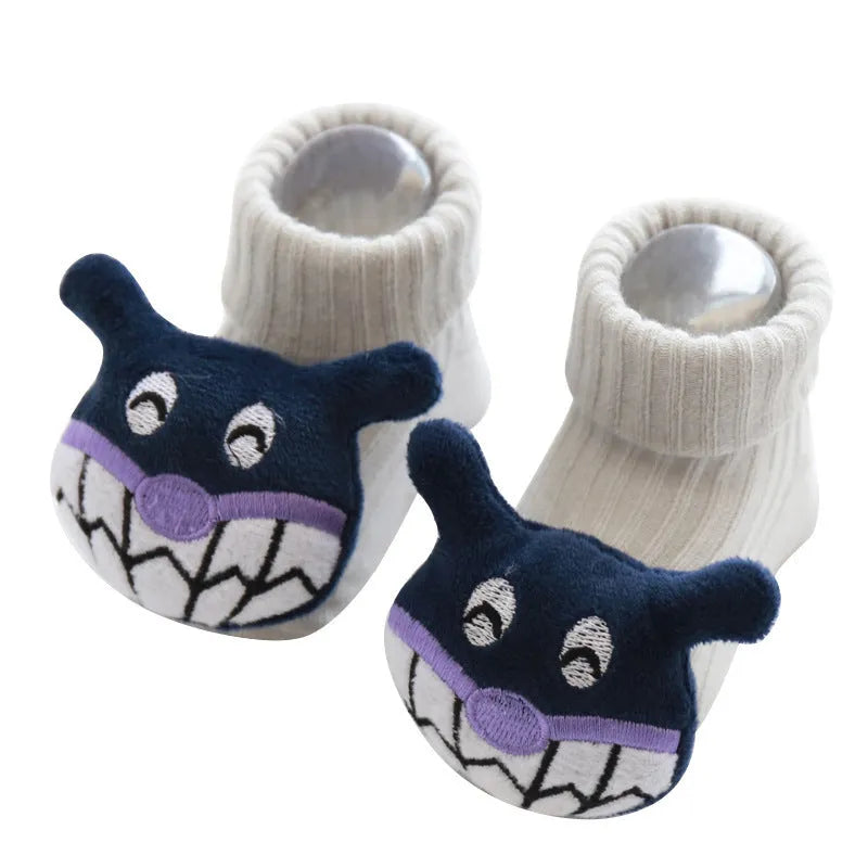 Baby floor socks in cotton with breathable fabric, showing size options XS S M and design variations including bows and animal prints