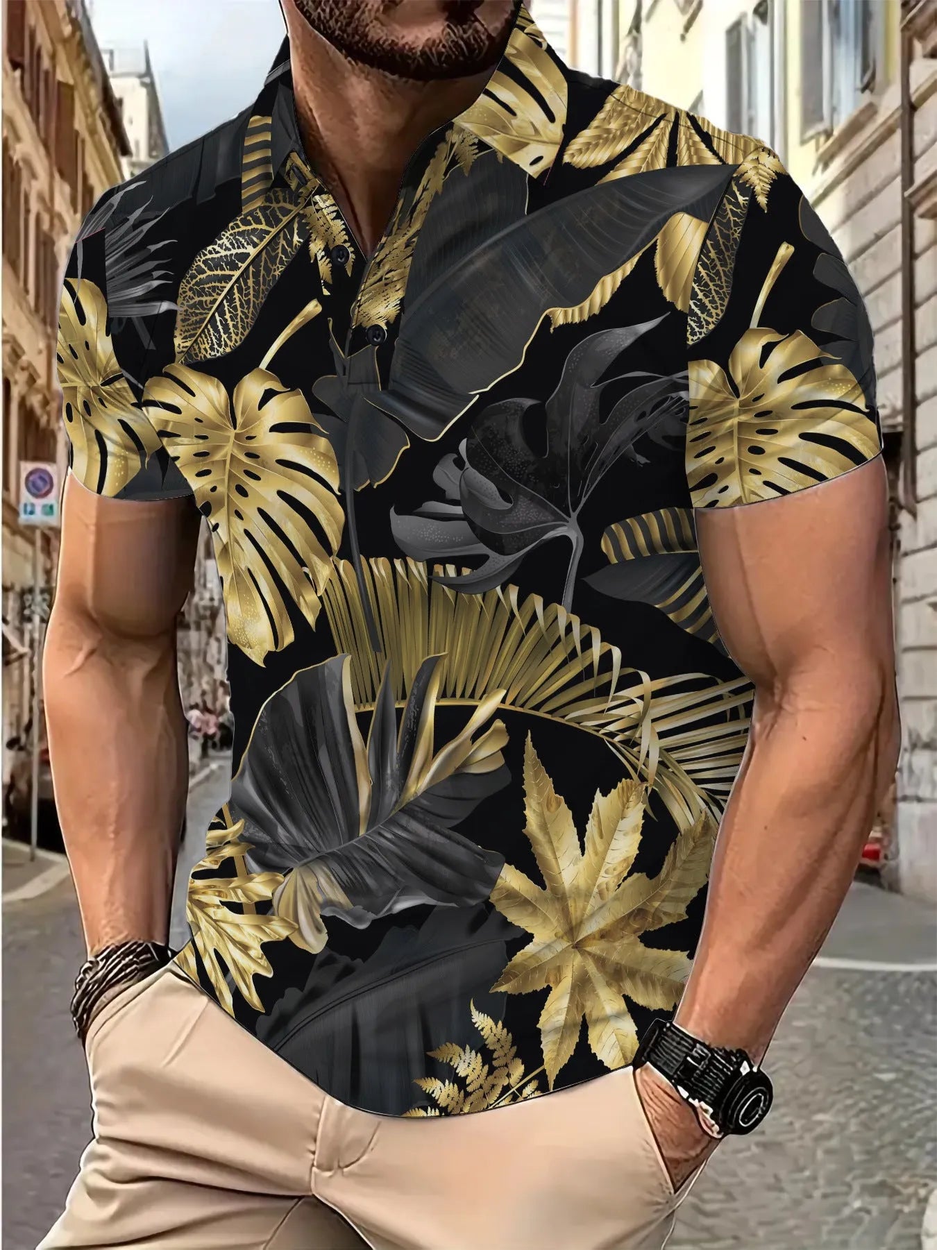 Men's gold short sleeve shirt with a large tropical leaf plant pattern print