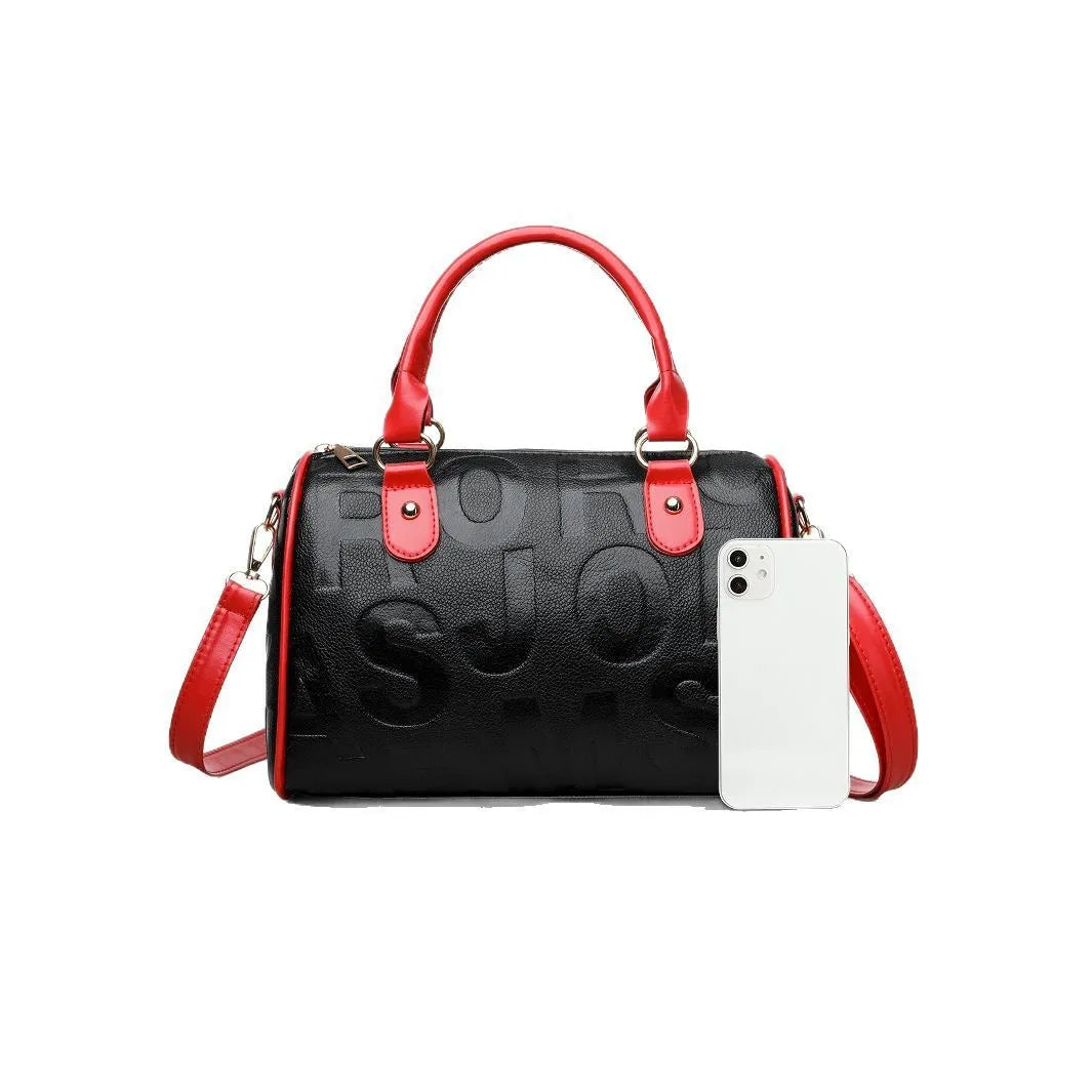 Brown cylindrical PU leather crossbody bag with three shoulder straps showing interior organisation