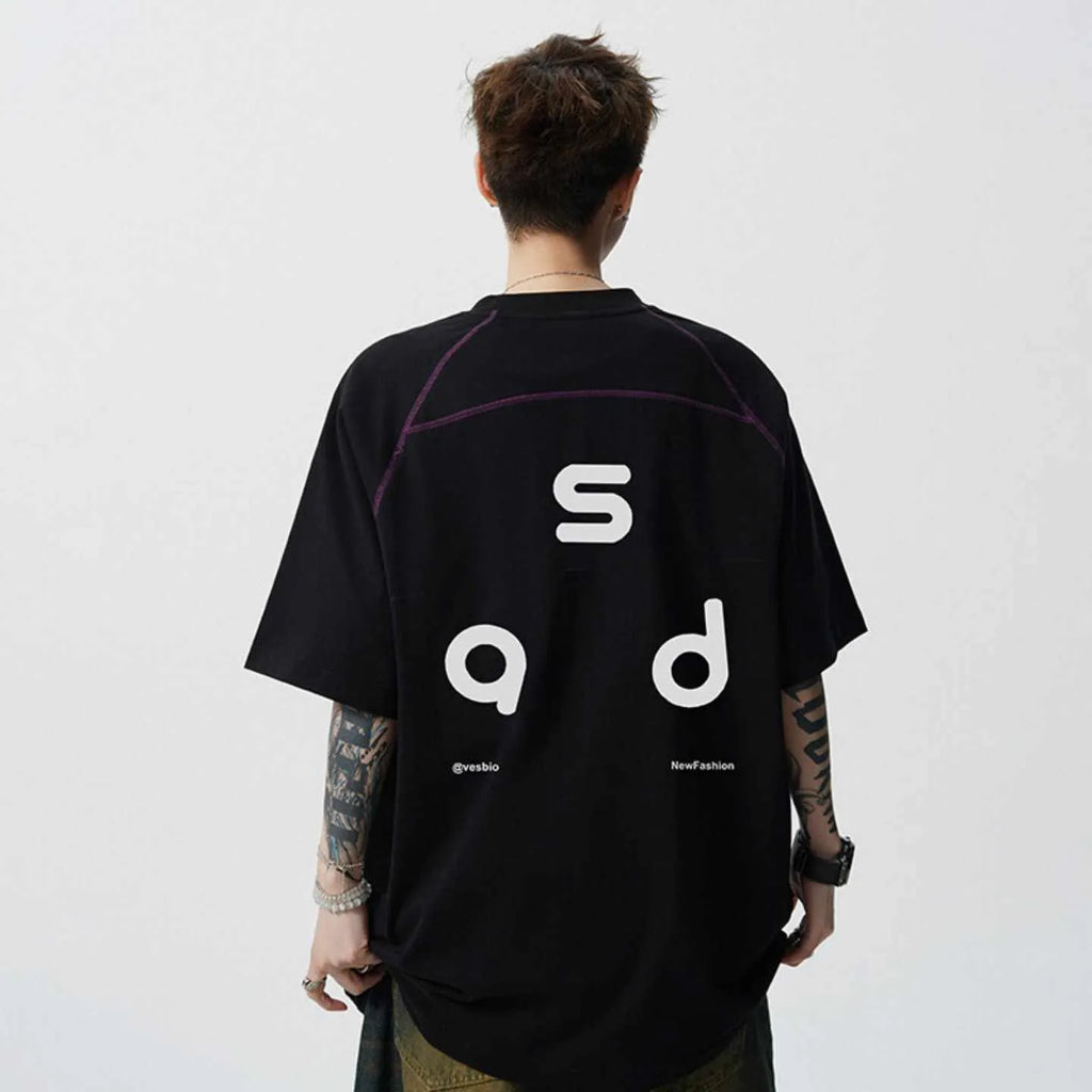 Men's loose fit black cotton T-shirt with a printed letter design on the front.