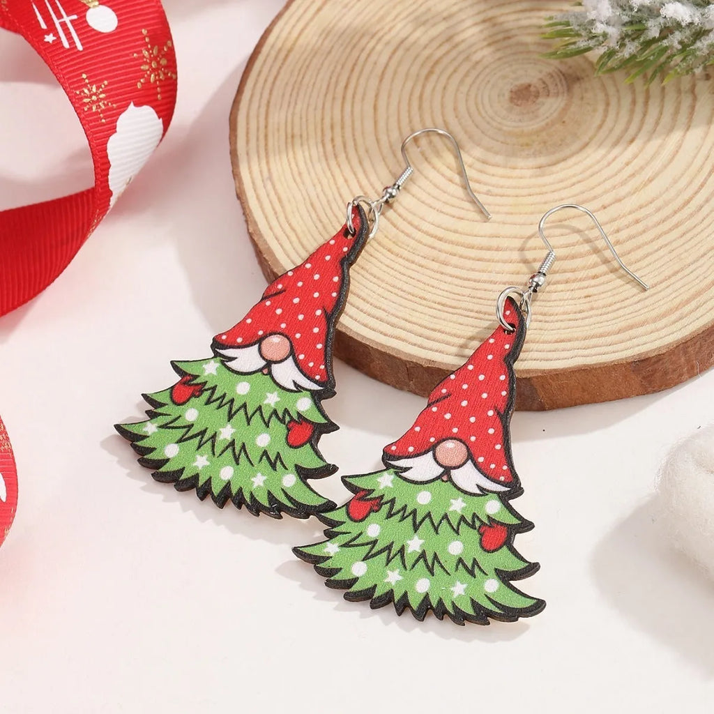 Wooden Christmas earrings with 3.5cm tree and 4cm snowman geometric shapes featuring printed festive details